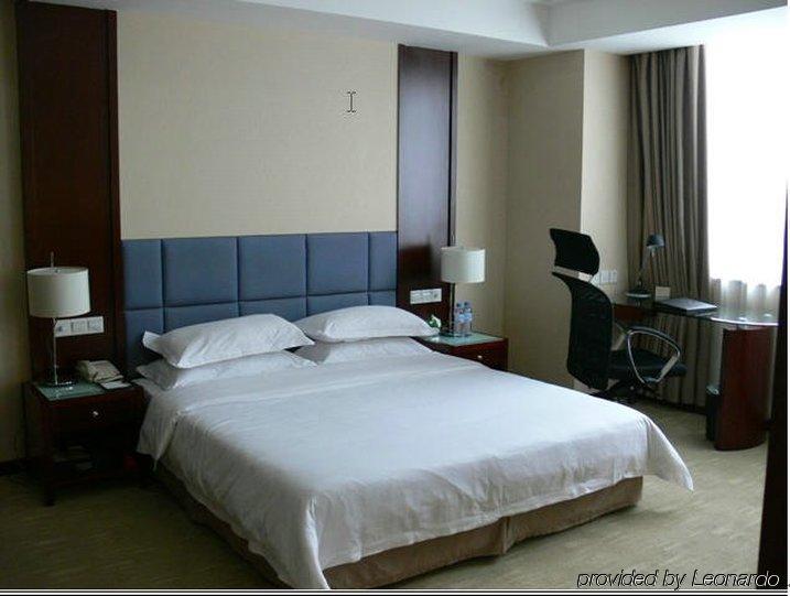 New Land Business Hotel Wuhan Cameră foto